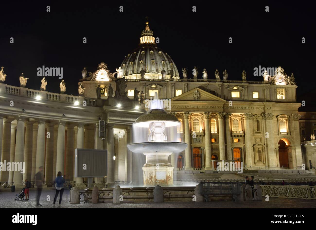 St. Peter's Basilica on St. Peter's Square by night in the city of Rome, Italy Stock Photo