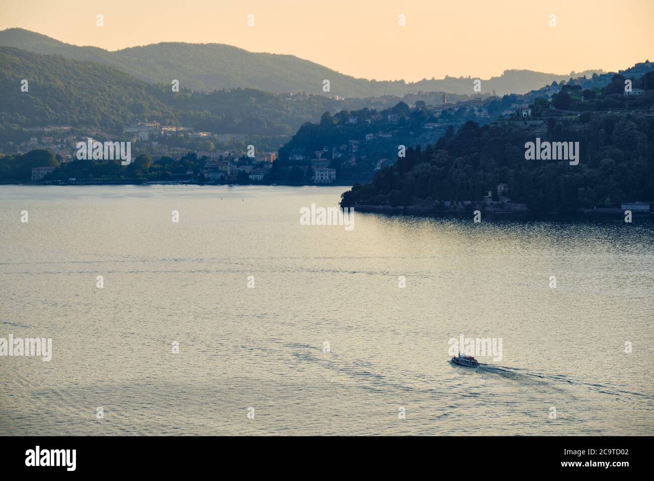 Ferry boat crossing the Lake Como (Lago di Como) between Torno and Cernobbio, small villages in Como, Italy, Europe Stock Photo