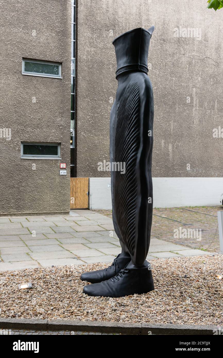 Giant hot water bottle on feet called 'Big Mother' Right side view in portrait format Stock Photo
