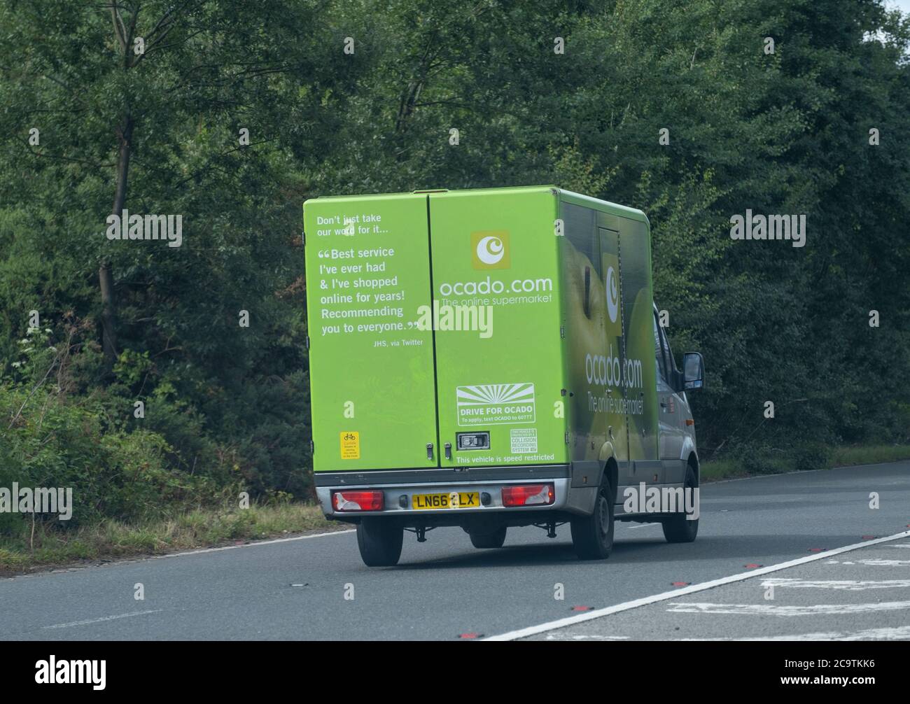 Ocado van on the A3 dual carriageway in Surrey, south east England, UK Stock Photo