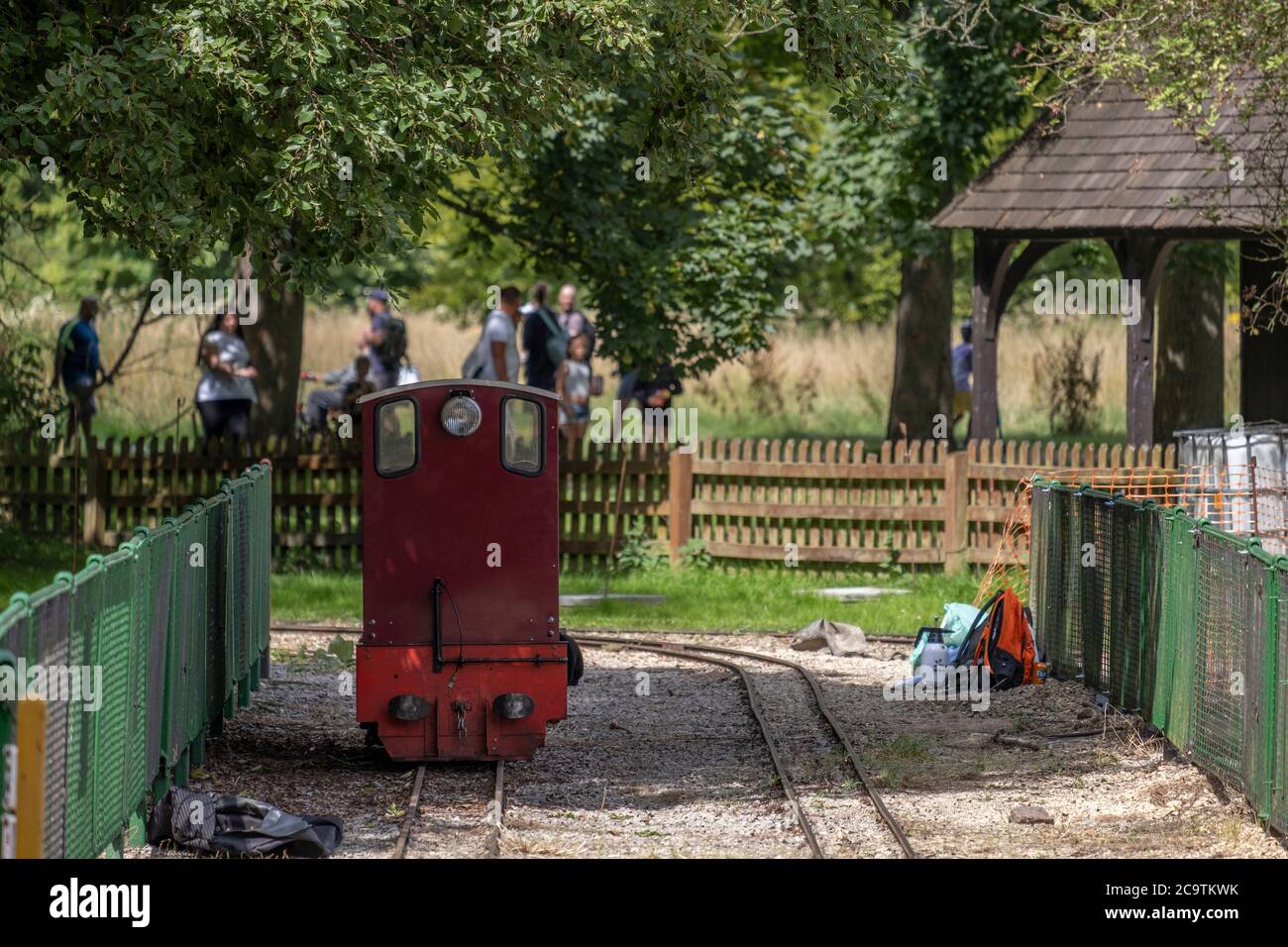 Watford, Hertfordshire, UK. 2 August 2020. Narrow gauge railway in Cassiobury Park, the largest public open space in Watford, attracts Sunday visitors Stock Photo