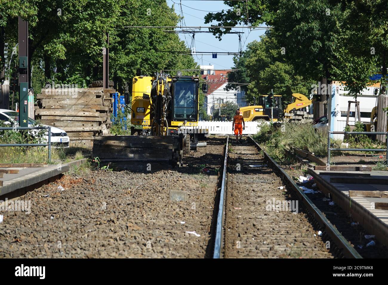 Berlin, Germany. 31st July, 2020. A construction site vehicle stands in the  track bed near the closed stop Straßmannstraße. The tracks of the M10 tram  line between Landsberger Allee and Bersarinplatz are