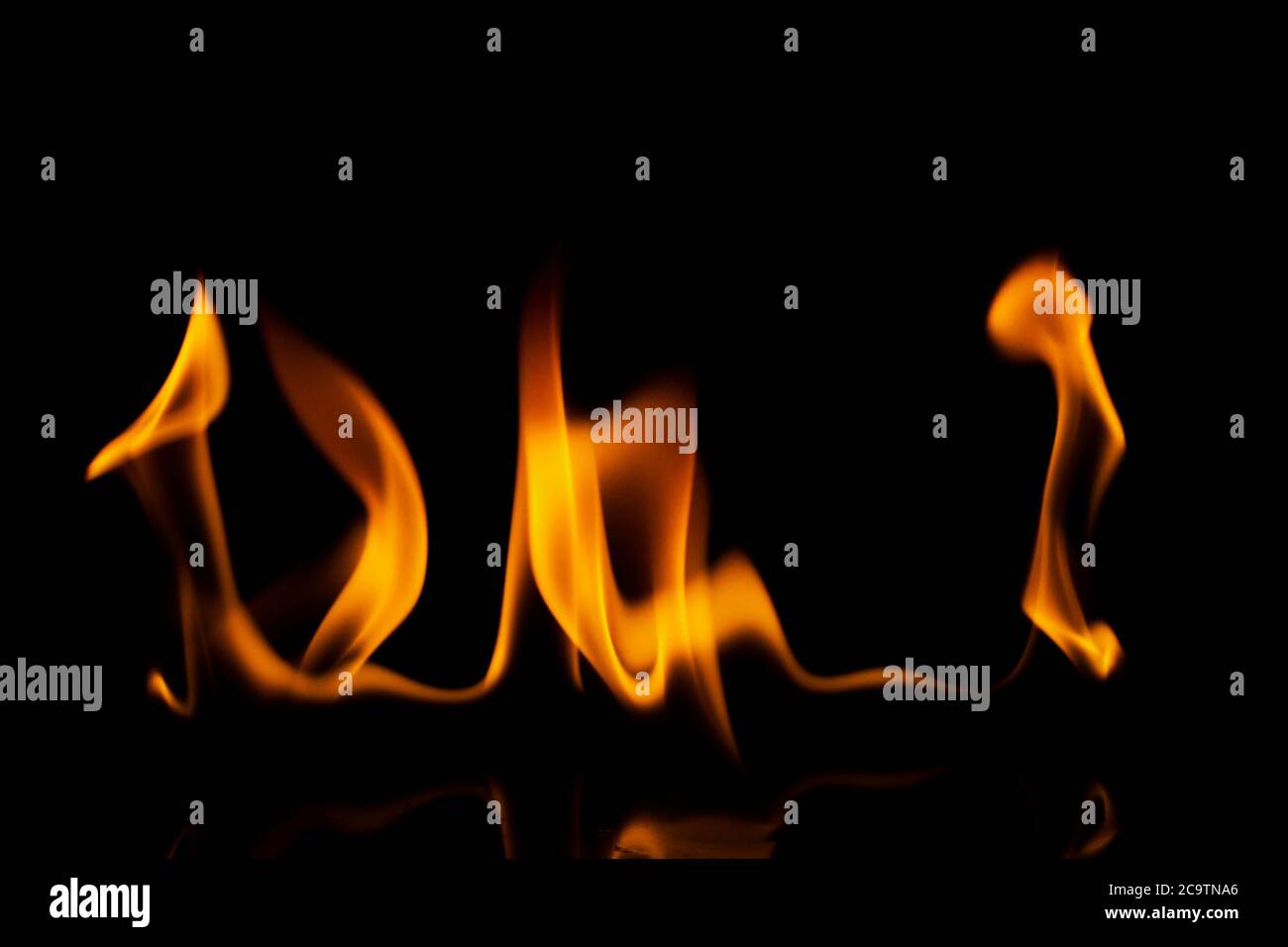 Fire flames isolated on black background Stock Photo - Alamy