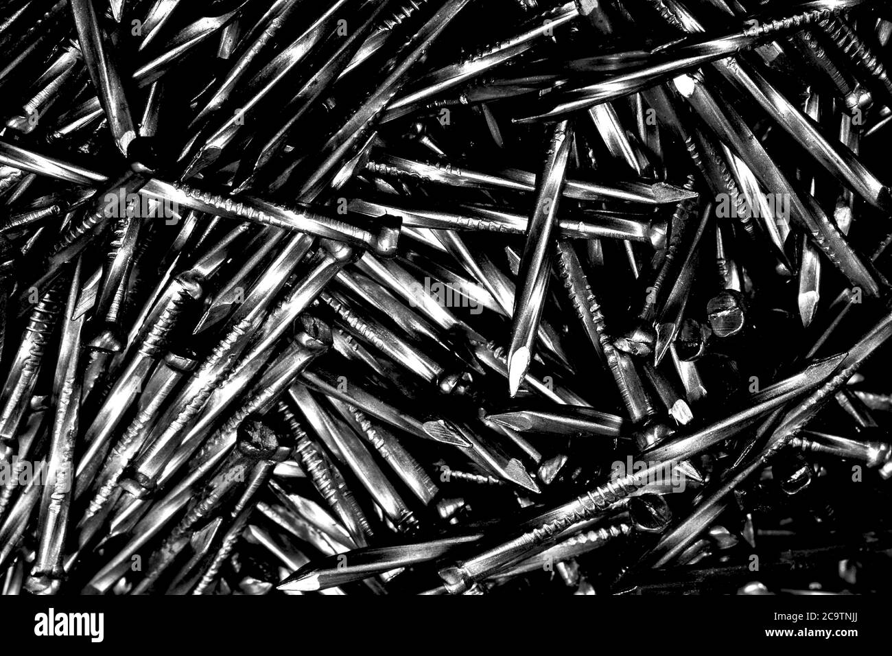 Pile of twisted steel nails Stock Photo