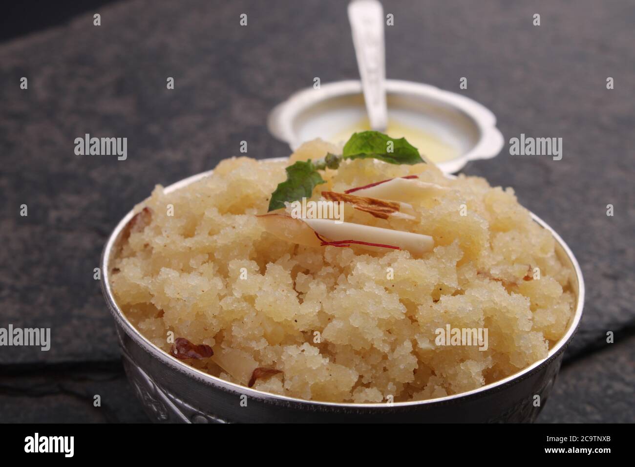 Suji ka halwa or ravyacha sheera as prasad for pooja on black