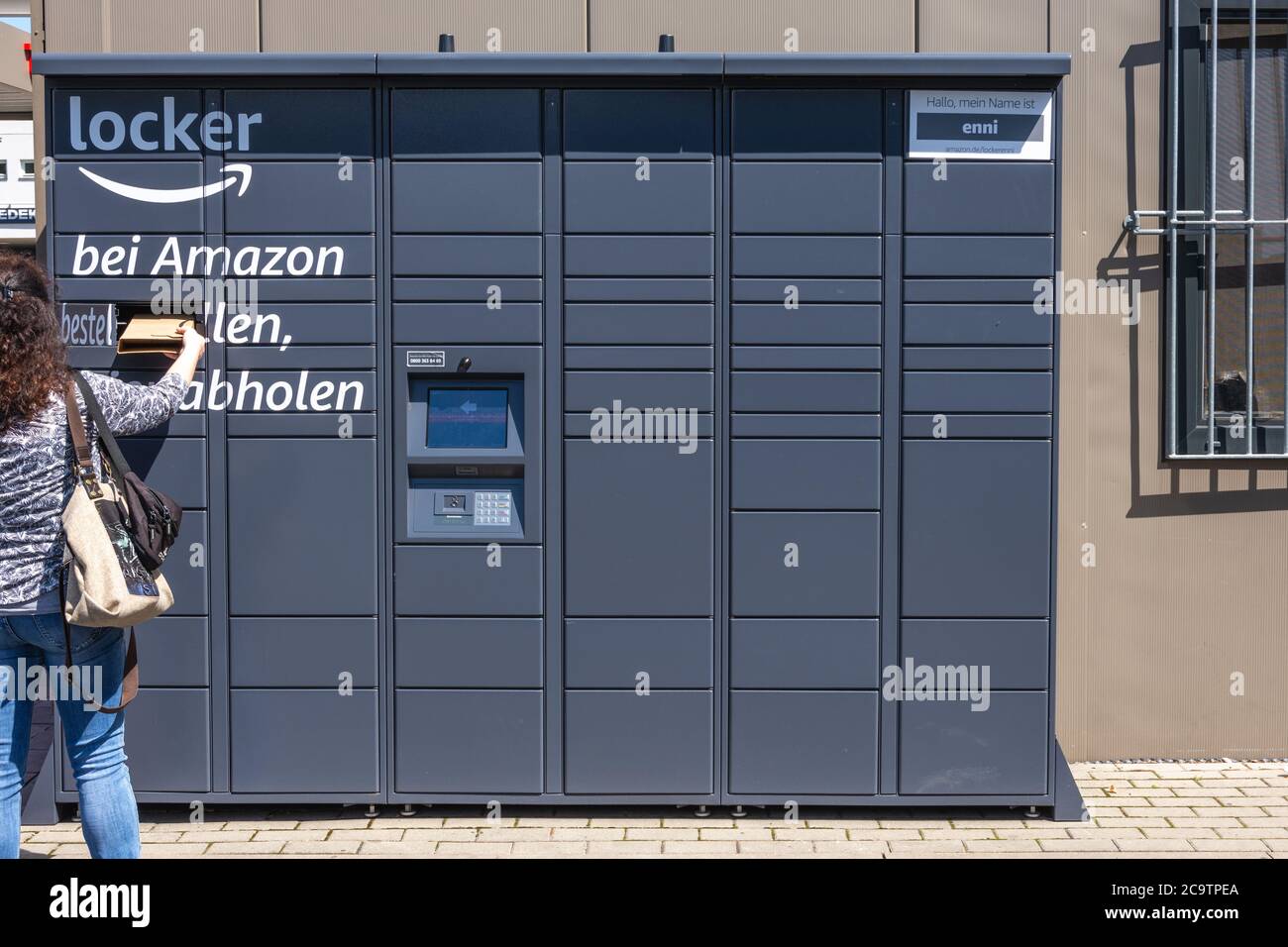 Amazon Packstation (locker), where customers can pick up their order  themselves. Landscape view from the front Stock Photo - Alamy