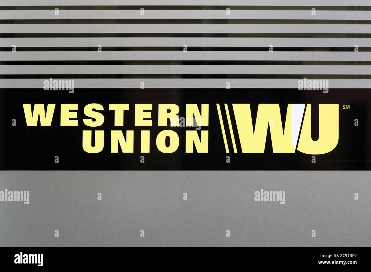 Lyon, France- July 19, 2018: Western Union sign on a facade. The Western Union company is an american financial services and communications company Stock Photo