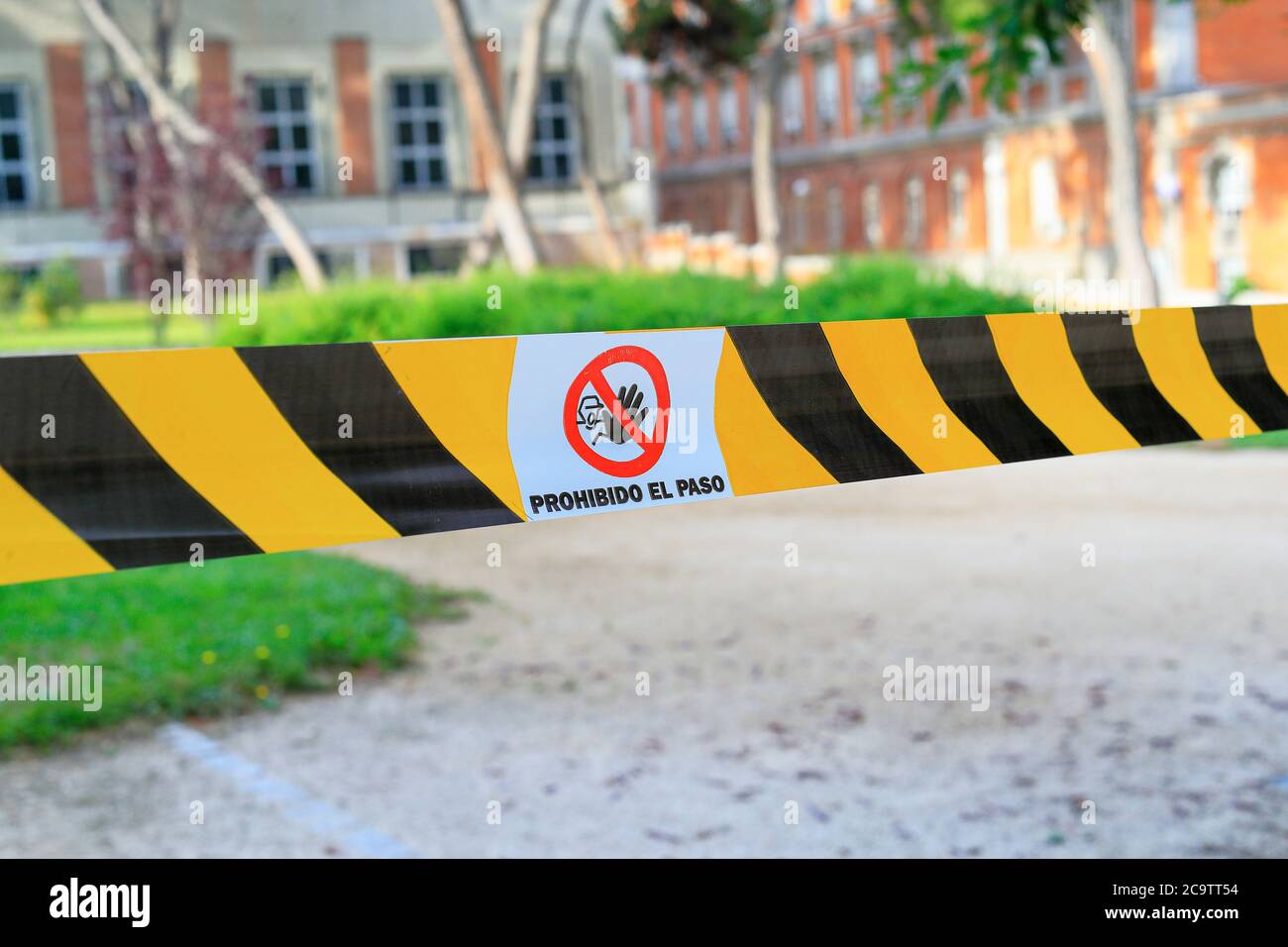 Madrid, Spain - June 5, 2020: The parks remain closed during the Covid-19 pandemic. Text translation: Prohibido el paso - Forbidden passage Stock Photo