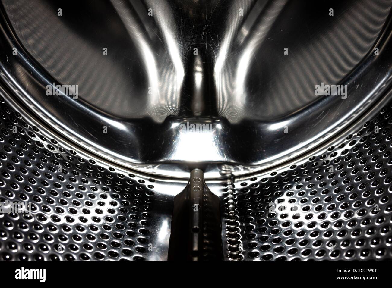 Inside view of an empty washing machine drum Stock Photo - Alamy