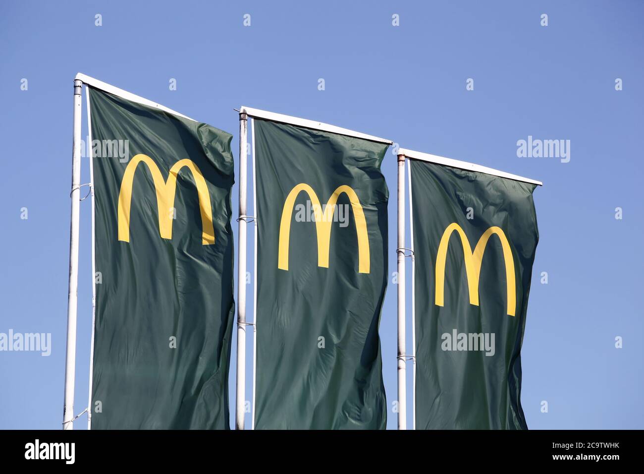 Villefranche, France - May 17, 2020: Flags of Mc Donald's. McDonald's is the world's largest chain of hamburger fast food restaurants Stock Photo