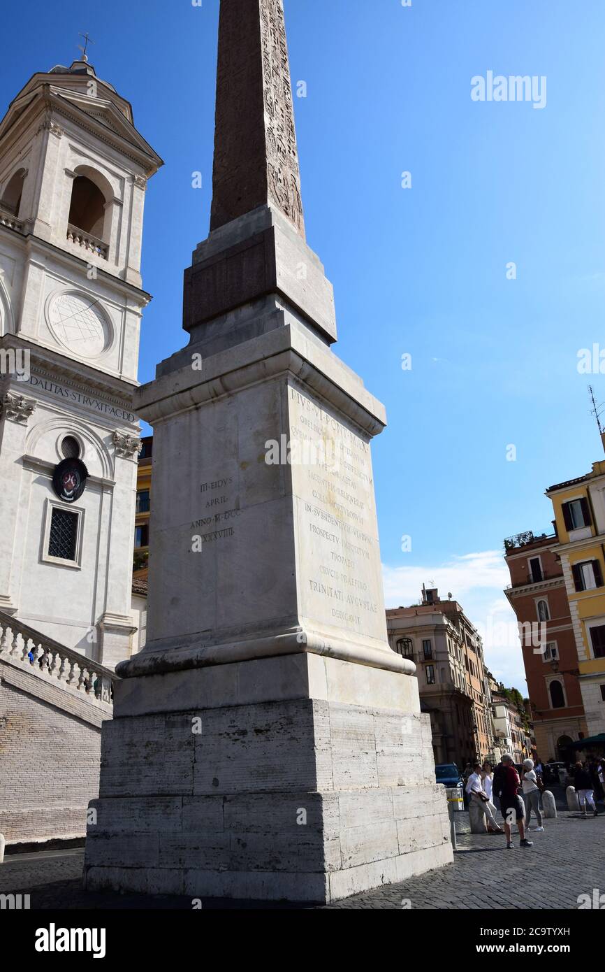 Chiesa di Trinita dei Mont and Obelisco Sallustianoi on the top of the Spanish Steps in the city of Rome, Italy Stock Photo
