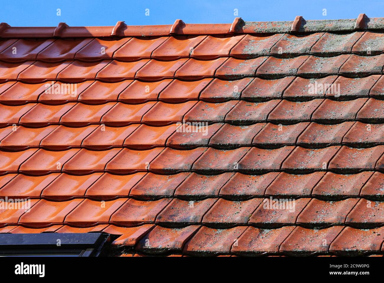 Roof cleaning with high pressure, before and after Stock Photo - Alamy