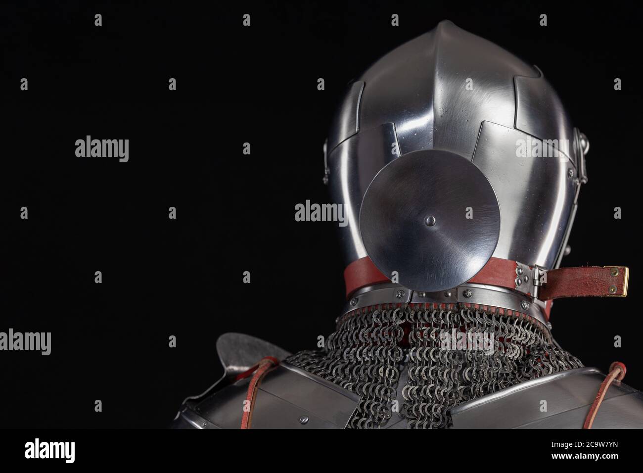 Mannequin man with a beard in a helmet and armor of a knight posing on ...