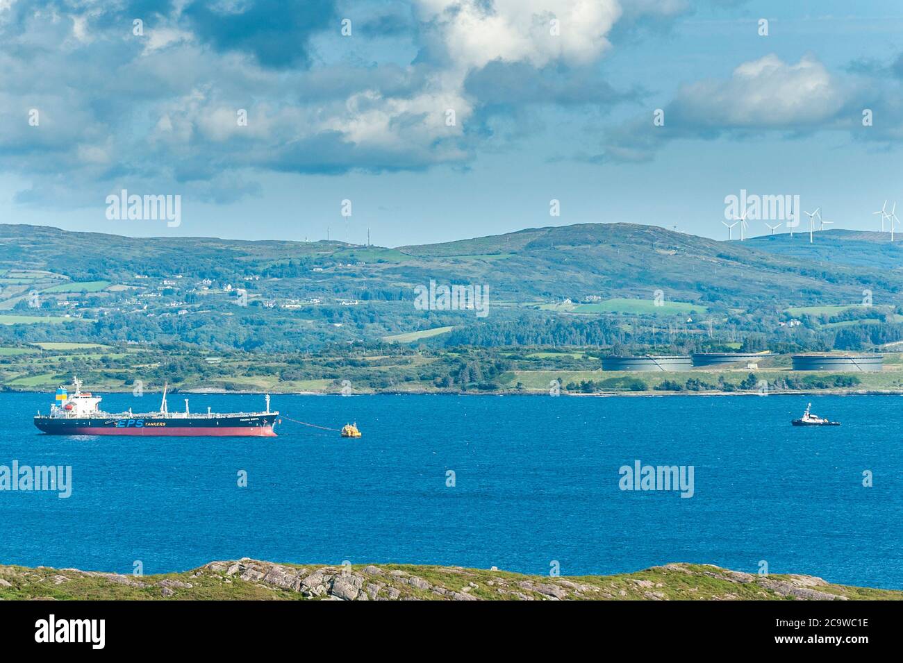 Bantry Bay, West Cork, Ireland. 2nd Aug, 2020. Crude oil tanker 'Pacific Beryl' offloads her cargo of oil at Whiddy Island Oil Terminal in Bantry Bay, West Cork.  Whiddy Island oil tanks can be seen in the background. Credit: AG News/Alamy Live News Stock Photo