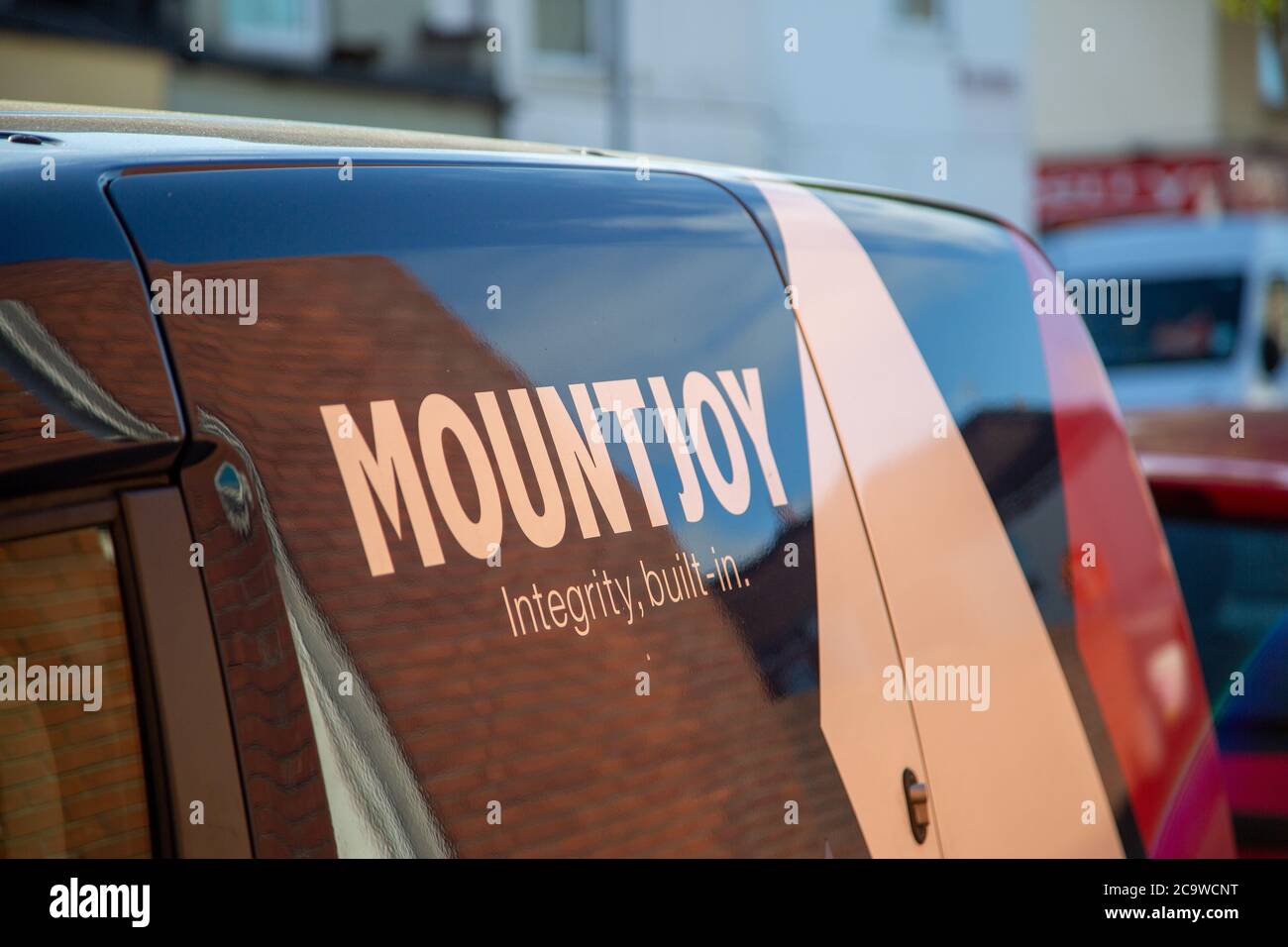 The logo of Mountjoy building services on the side of a van Stock Photo