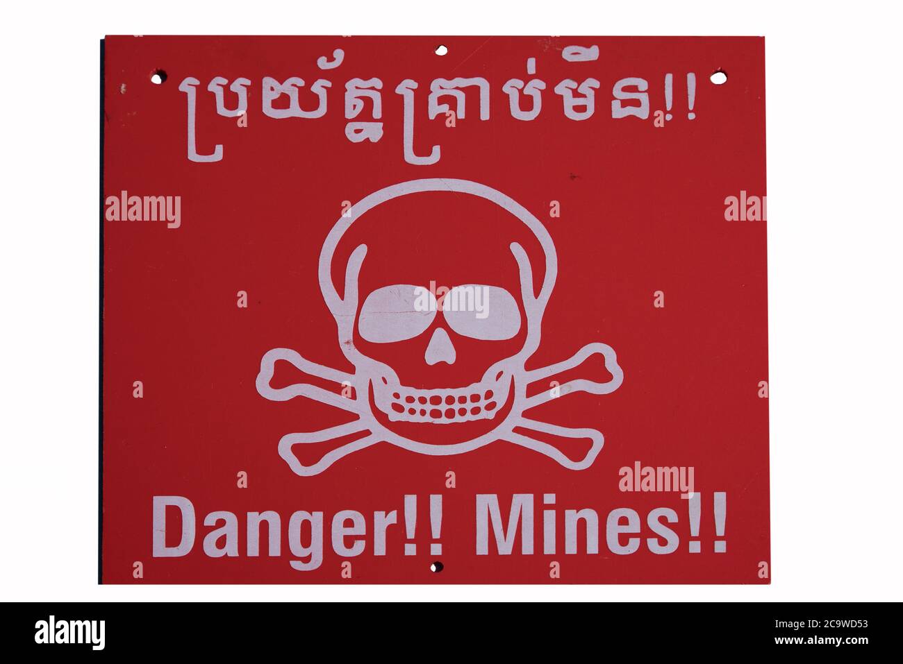 Warning sign from a minefield Stock Photo
