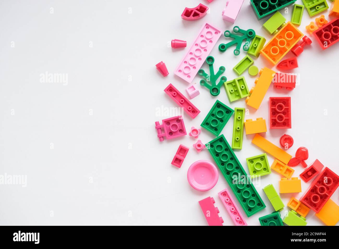 Toys background. Colorful cubes and plastic construction blocks frame ...