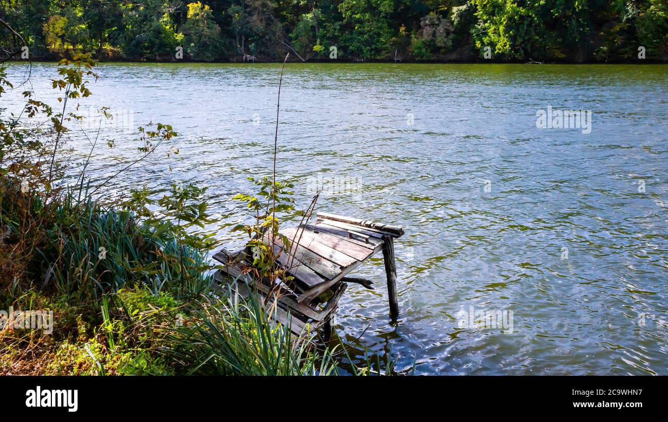 Riverbank landscape and wooden catwalk Stock Photo Alamy