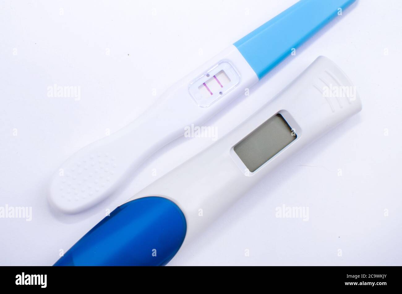 two pregnancy tests. white background. Stock Photo