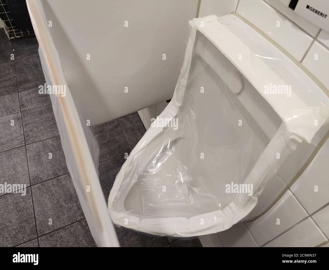 Toilet two men hires stock photography and images Alamy