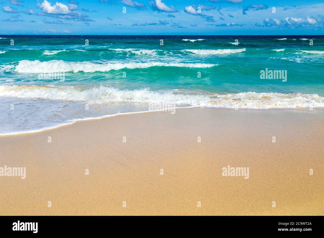 Clean sand and blue water at Platja de Llevant, Formentera, Spain Stock Photo