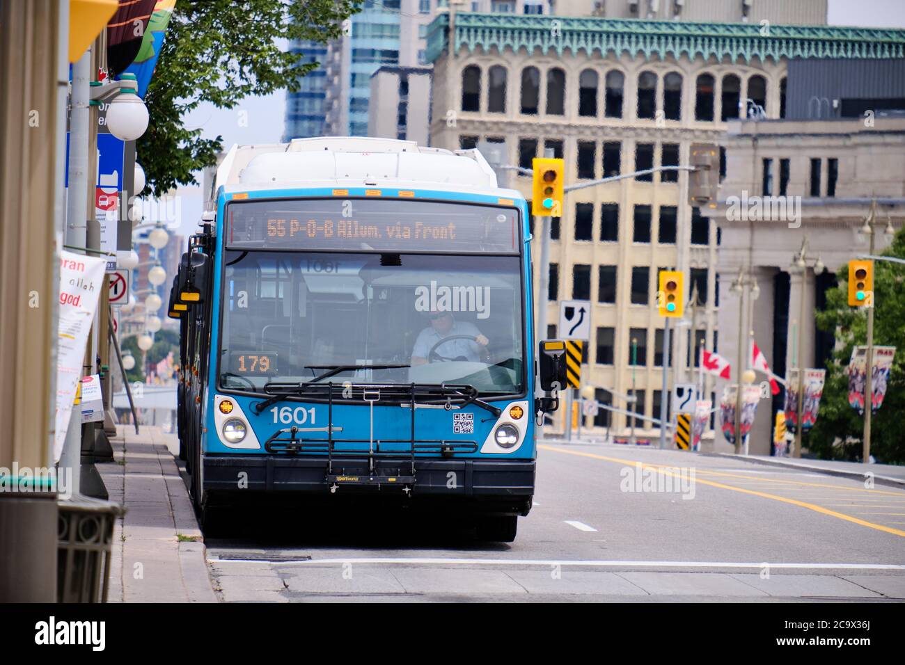 Ottawa, Canada, July 20, 2020.  Gatineau public bus on the streets of Ottawa, with maskless driver Stock Photo