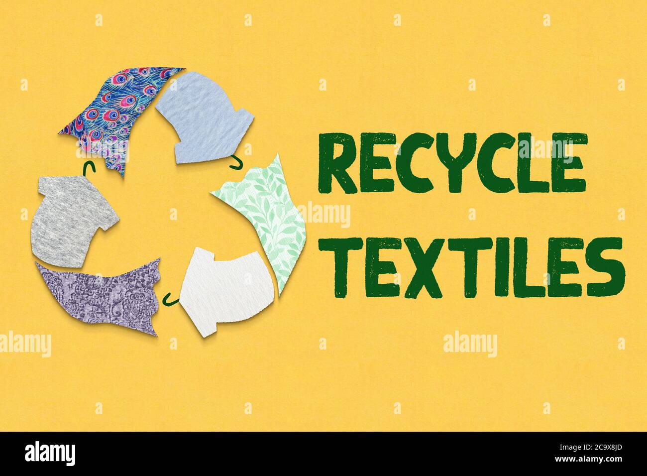 Recycle textiles symbol made from old clothing fabric on yellow background with Textiles text. Top view or flat lay. Reuse, reduce, recycle fo Stock - Alamy