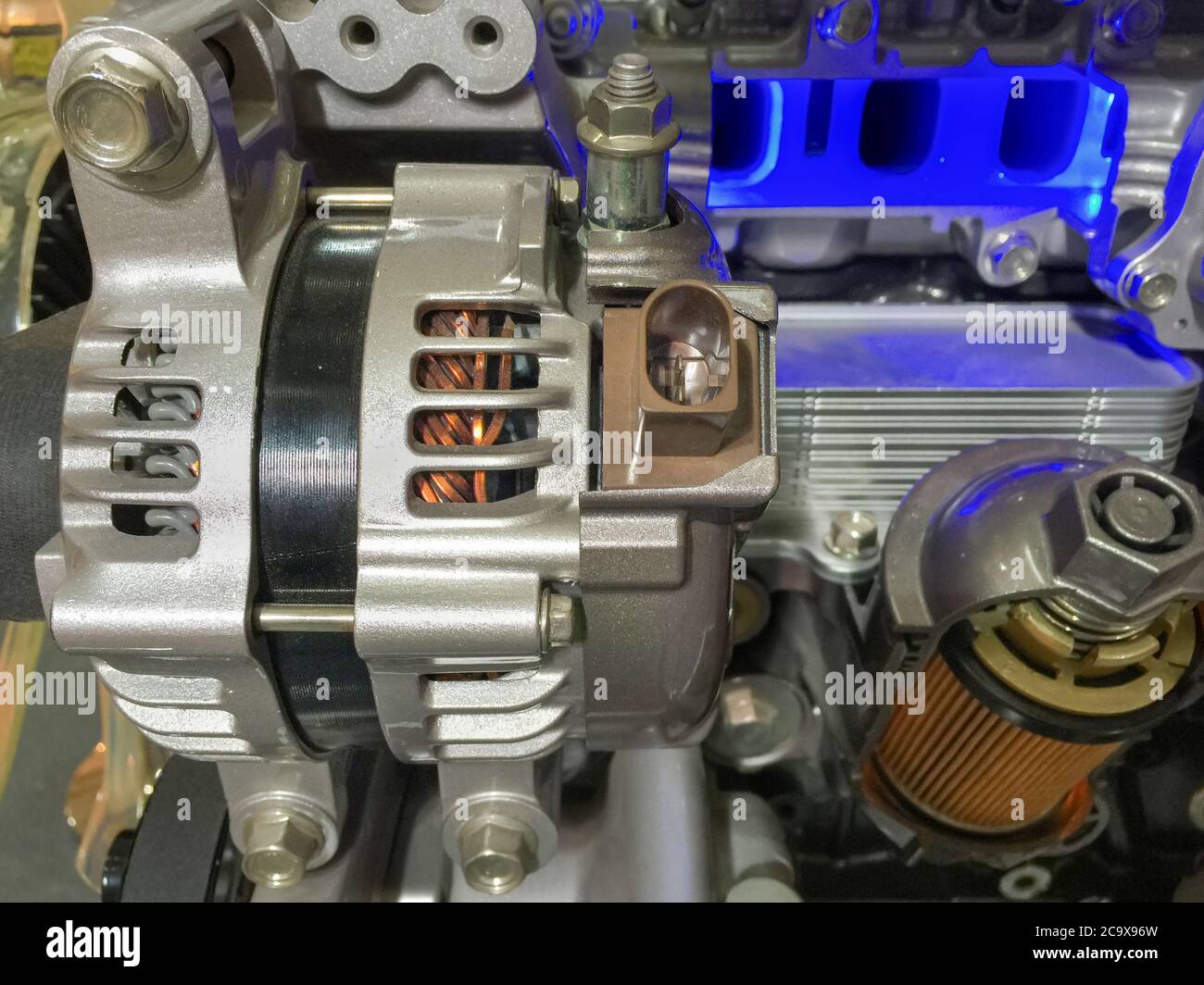 Car alternator and engine oil filter cross section , display inside