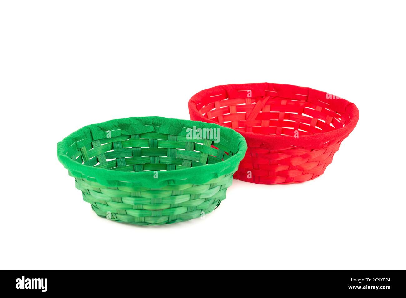 Two empty wicker baskets isolated on white background. Stock Photo