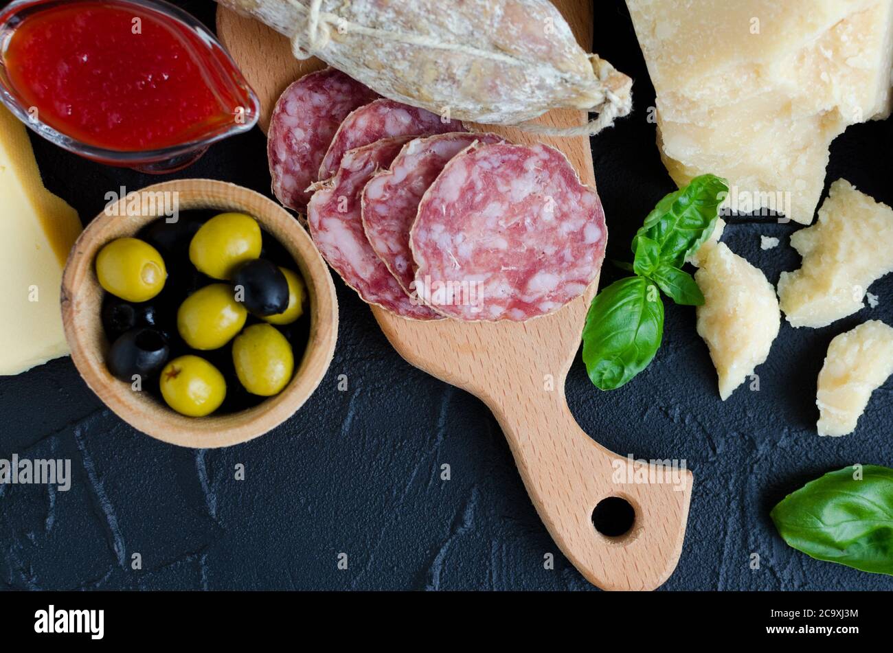 Table full of mediterranean appetizers, tapas or antipasti. Assorted ...