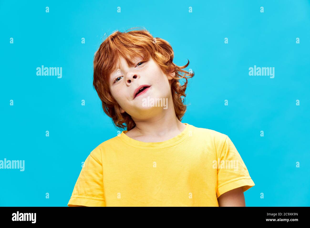 Adorable child head tilted side hires stock photography and images Alamy
