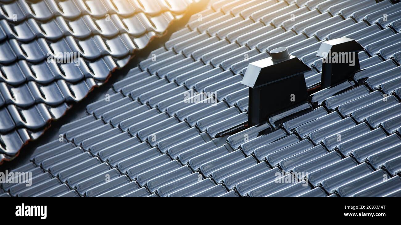 Modern black ceramic roof tiles Stock Photo