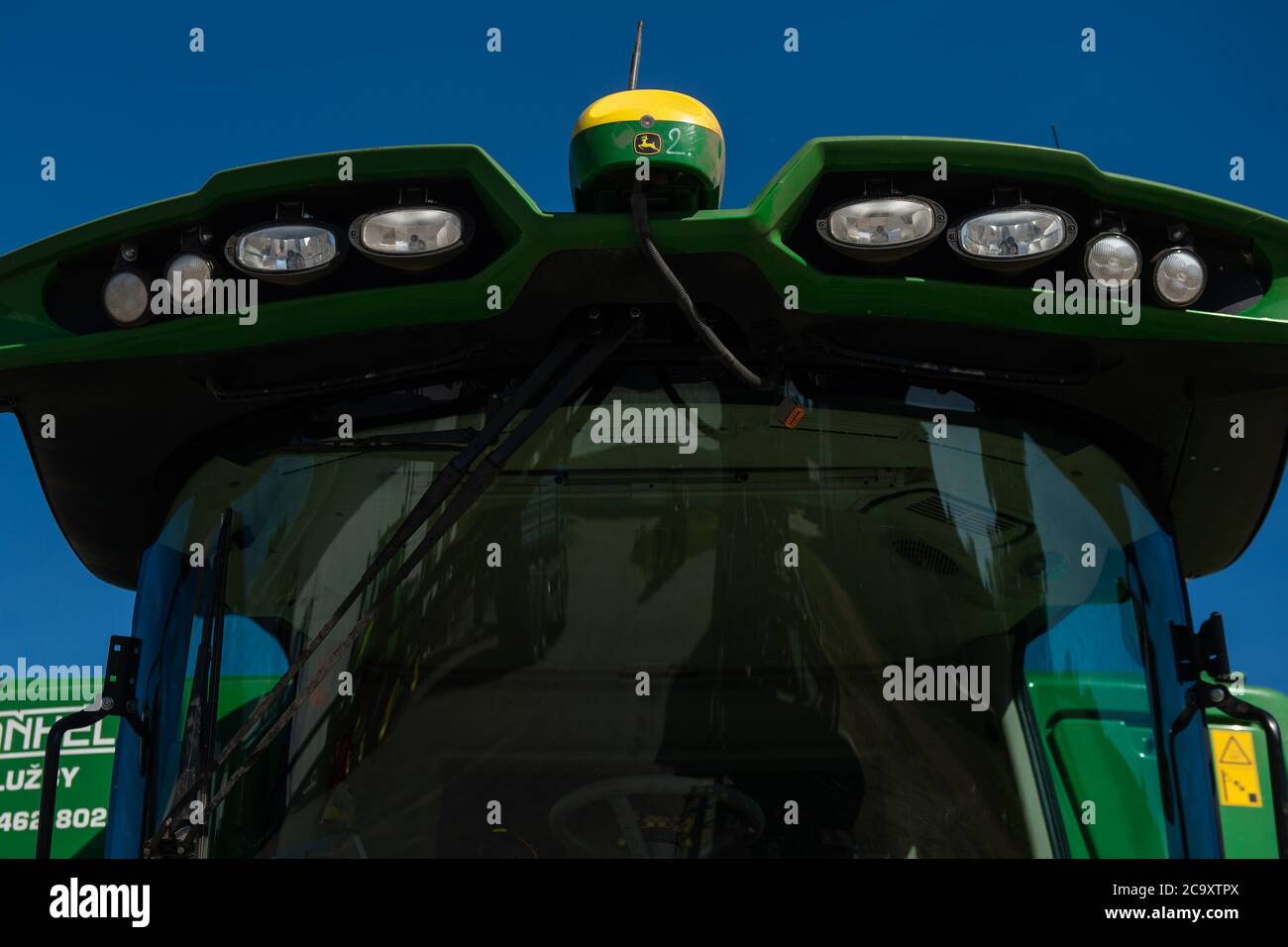 Vlastibor, Czech Republic. 31st July, 2020. John Deere Combine GPS  Technology is seen on the roof of a combine harvester on July 31, 2020, in  Vlastibor, Czech Republic. Credit: Vaclav Pancer/CTK Photo/Alamy