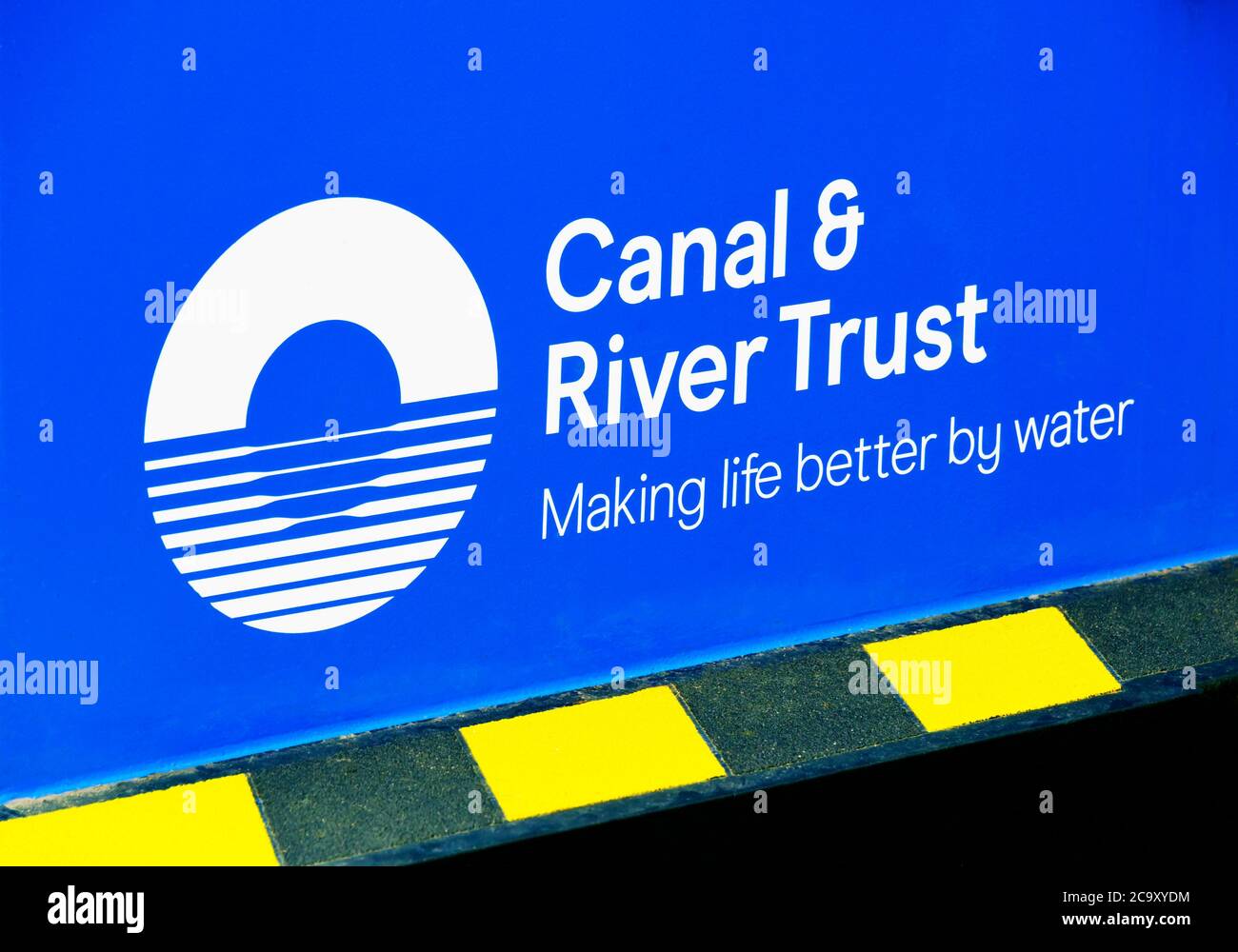Canal & River Trust logo on canal narrowboat. Glasson branch of the Lancaster Canal. Glasson, Lancashire, England, United Kingdom, Europe. Stock Photo