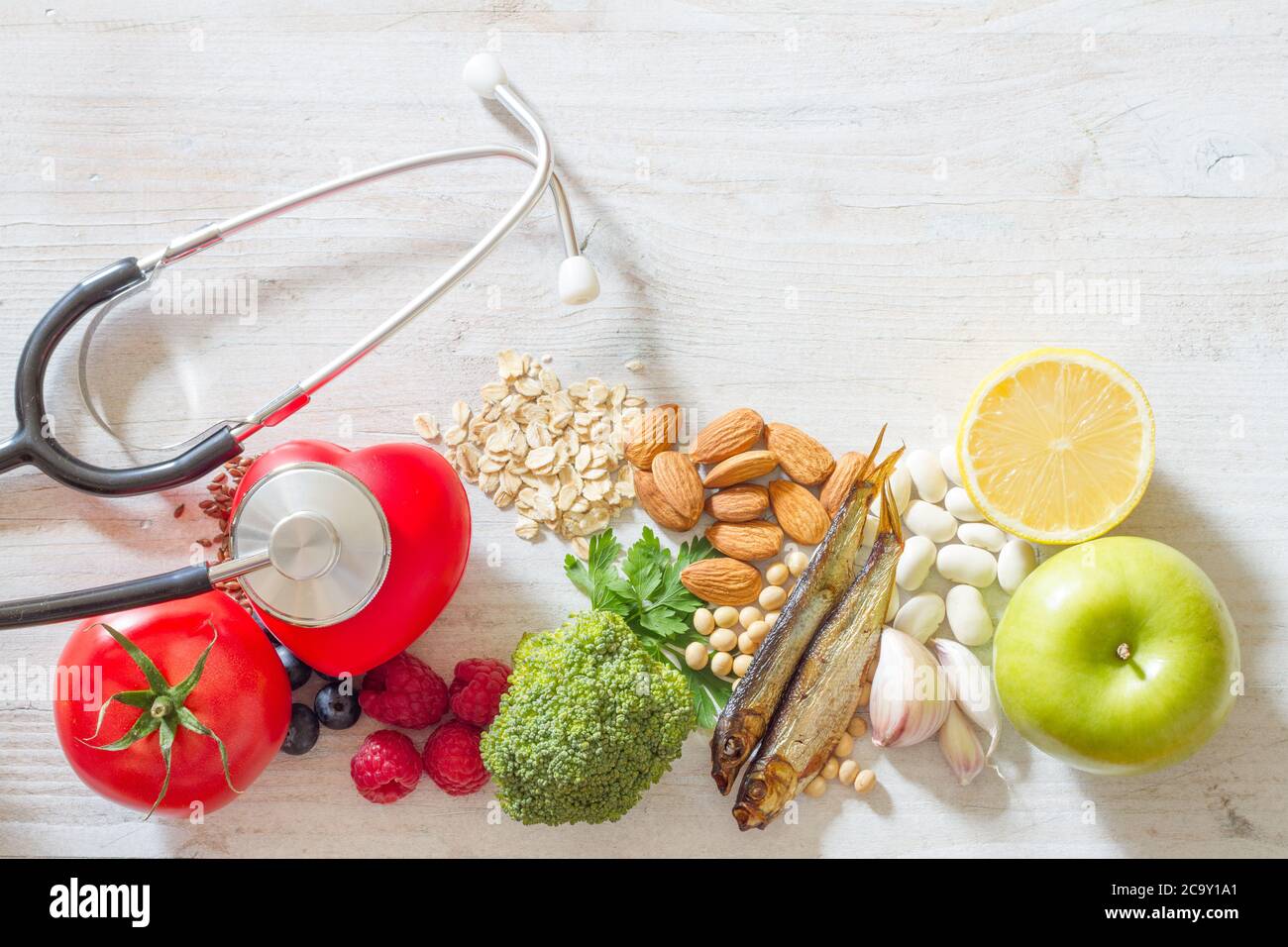 Selection food good for heart with stethoscope, healthy diet concept Stock Photo