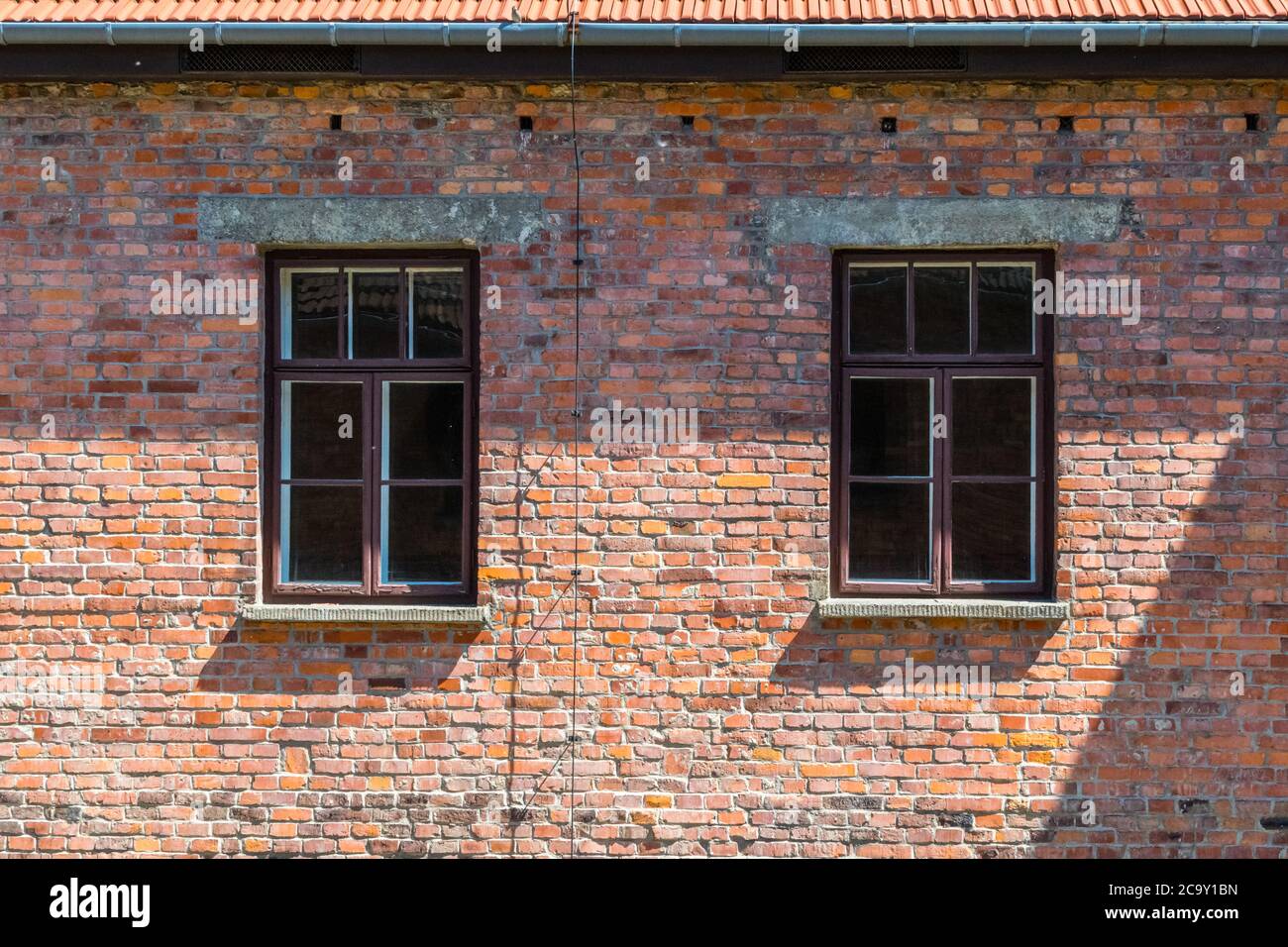 dark windows in old brick wall abandoned building Stock Photo - Alamy