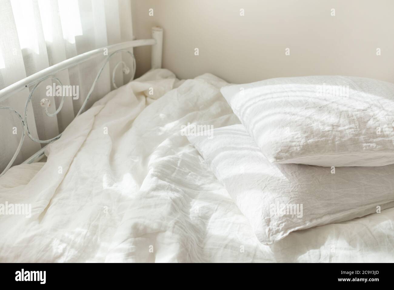 White Linen Textile Bedclothes Pile Of Pillows Cozy Bedroom Interior And Beautiful Morning Light Pastel Color Trendy Organic Natural Linen Stock Photo Alamy