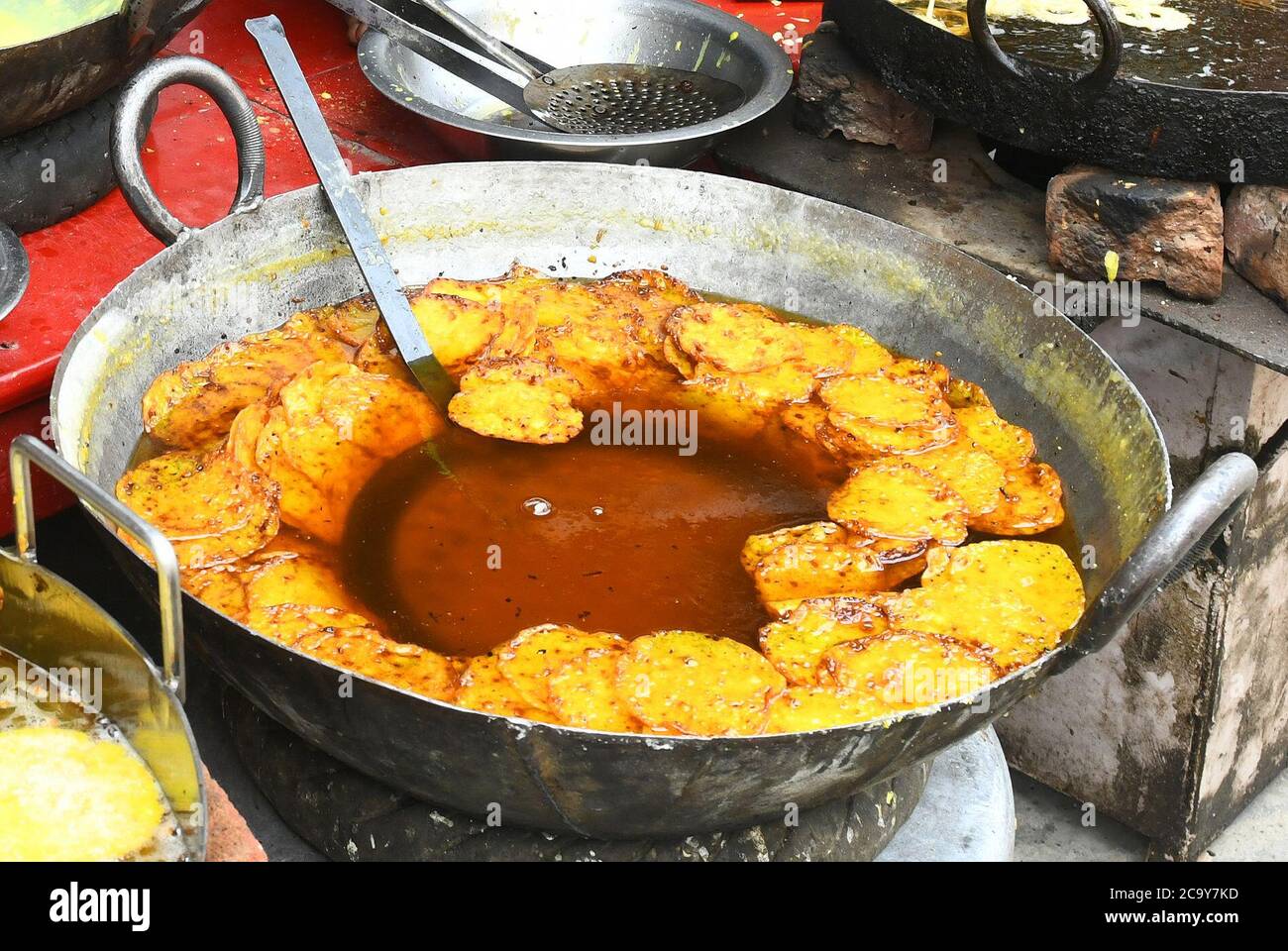 Indian Traditional Sweet Named Malpua Cooking in Hot Oil in Kadai (Frying  Pan). This Delicious Dessert is Famous in Ajmer - Rajasthan, India. Stock  Photo