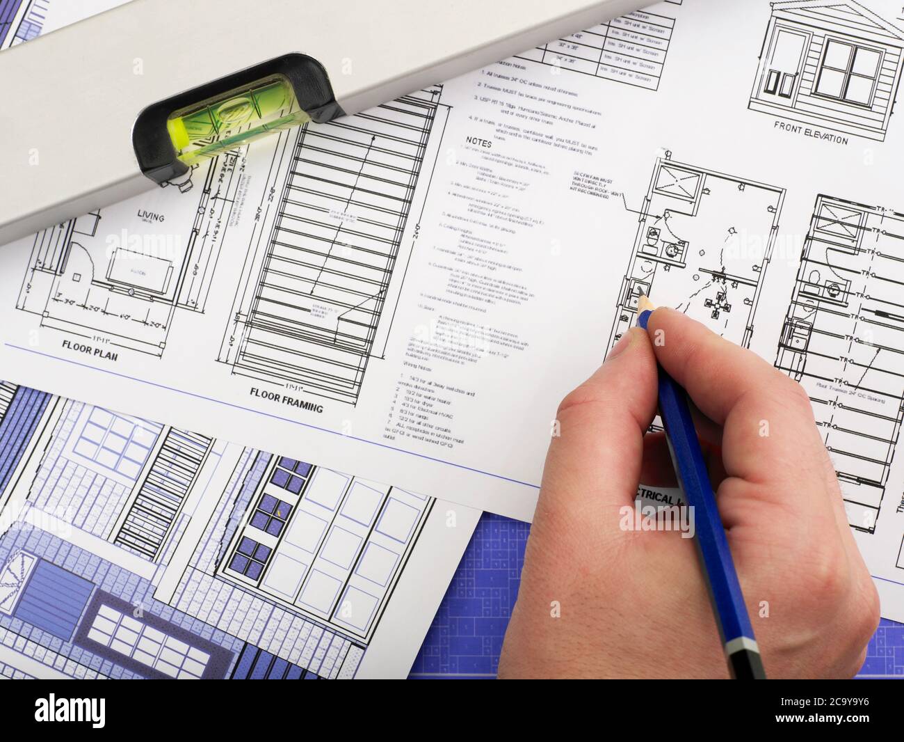 Working on blueprints Stock Photo