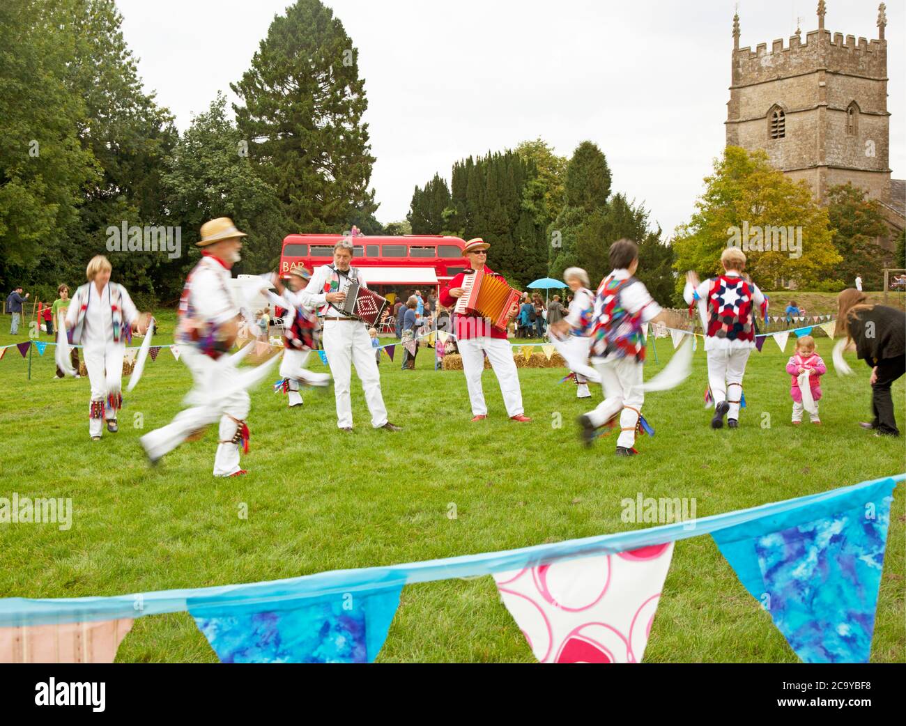 Morris dancers at a Cotswold village fete on the local playing field Stock Photo