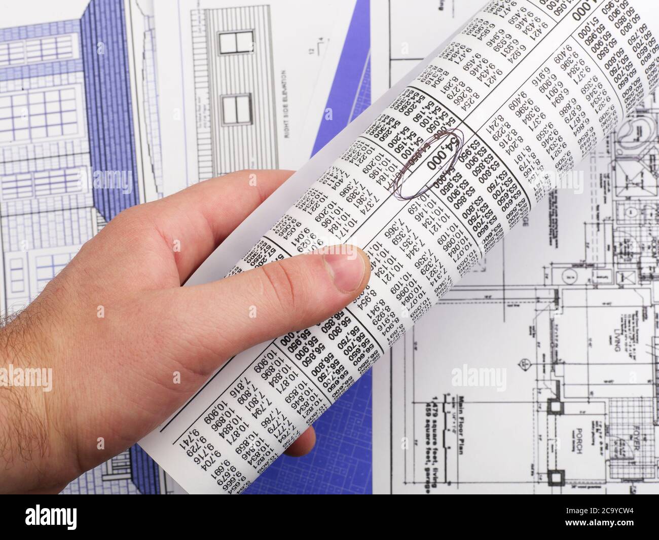 Working on blueprints Stock Photo