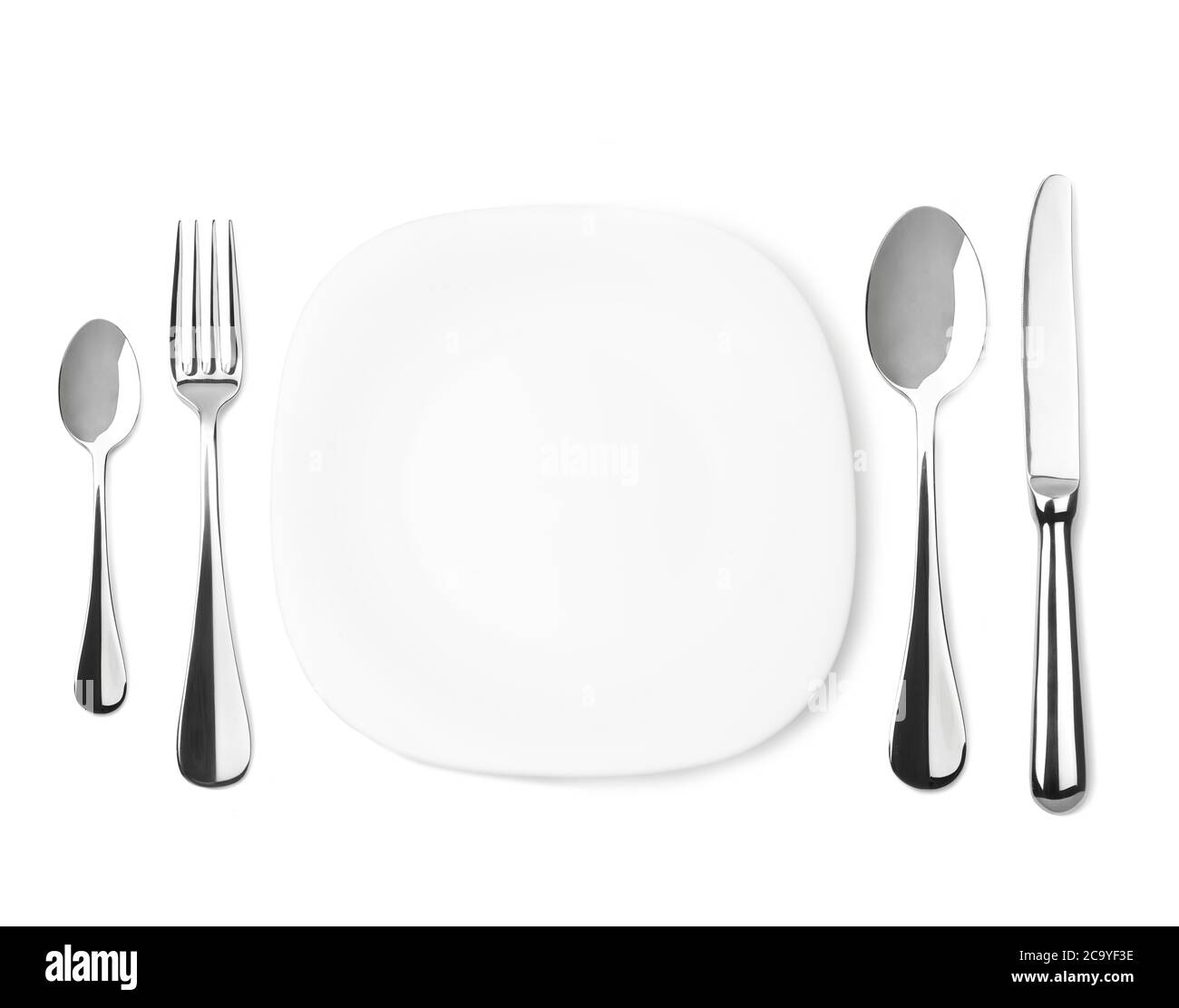 Dinner place setting isolated on white Stock Photo Alamy