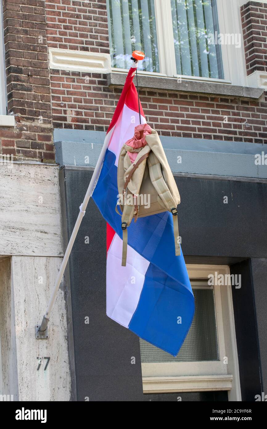 Schoolbag On A Flag At Amsterdam The Netherlands 12-6-2020 A Dutch Tradition For Passing School Exams Stock Photo