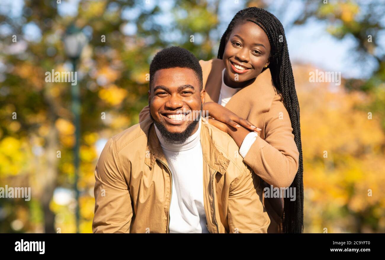 Portrait of happy african american couple posing outdoors Stock Photo ...