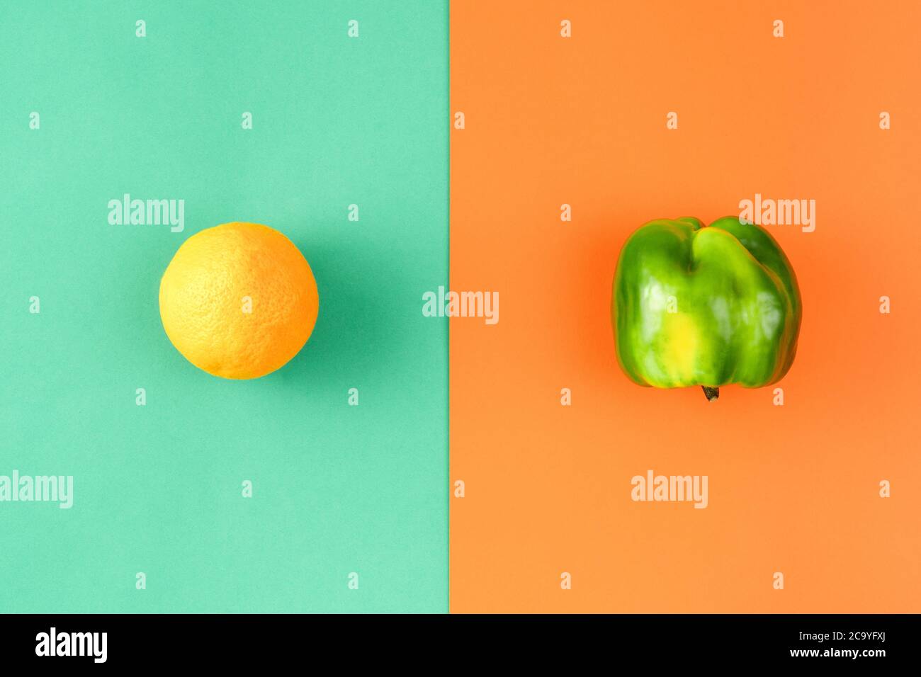 Creative layout made of orange and pepper. Food concept. Fresh grocery Stock Photo