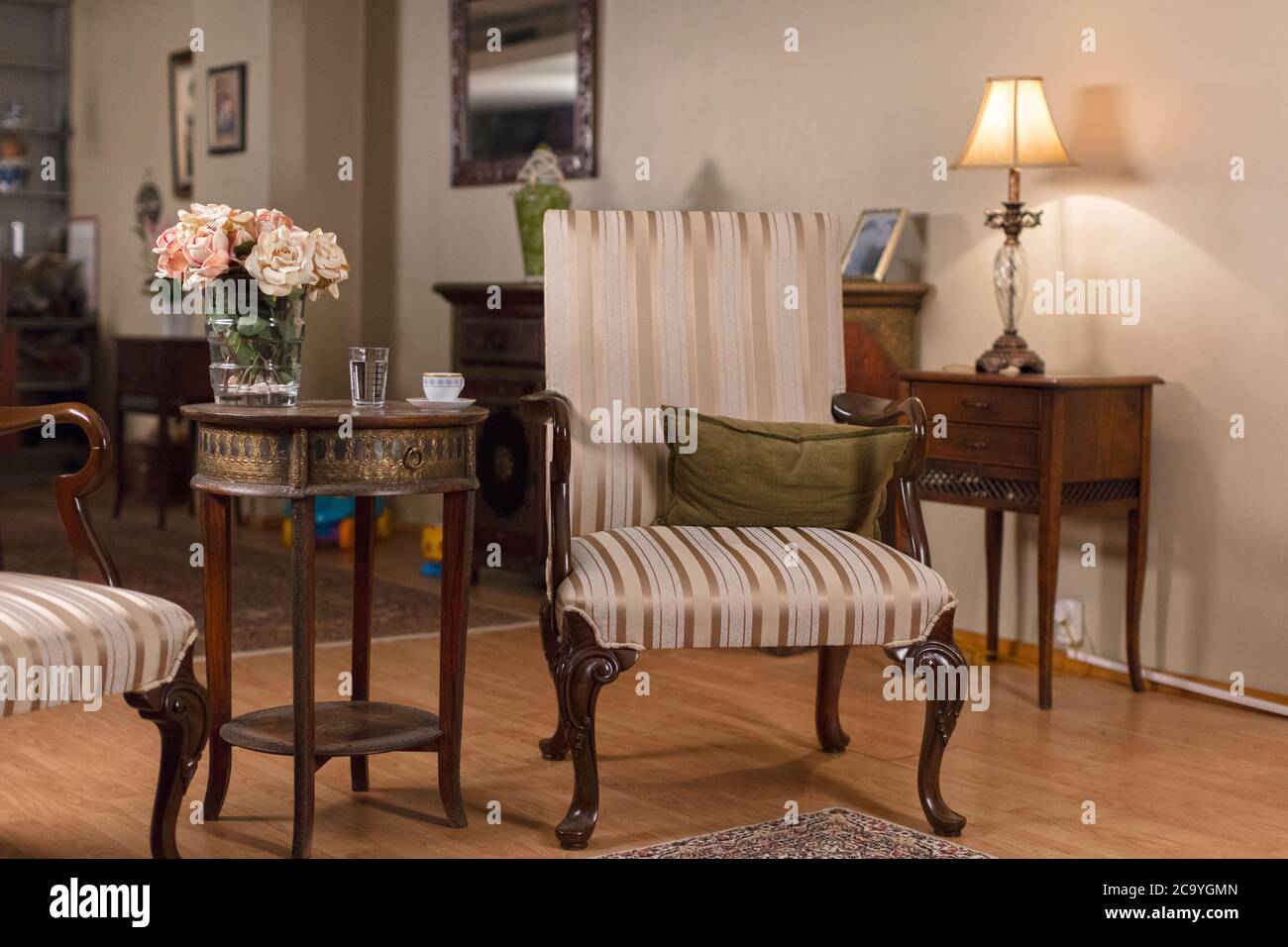 Vintage Single Armchair and Blur Room Background Stock Photo - Alamy