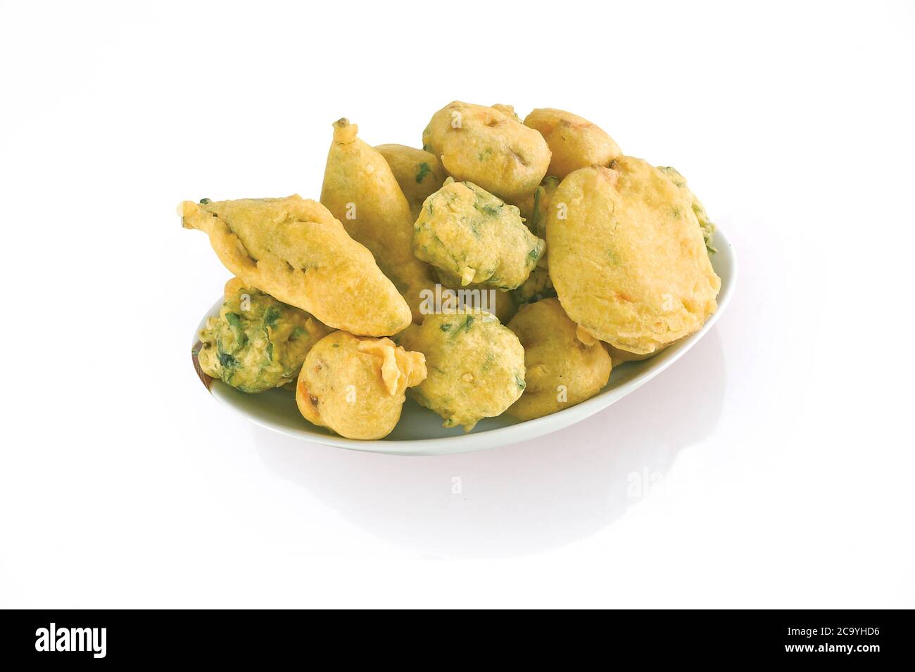 Methi Gota (fenugreek) Pakoda, Chili pakoda, potato pakoda (vada) or Fritters indian food snack, bhajiya, white background, photographi - Image Stock Photo