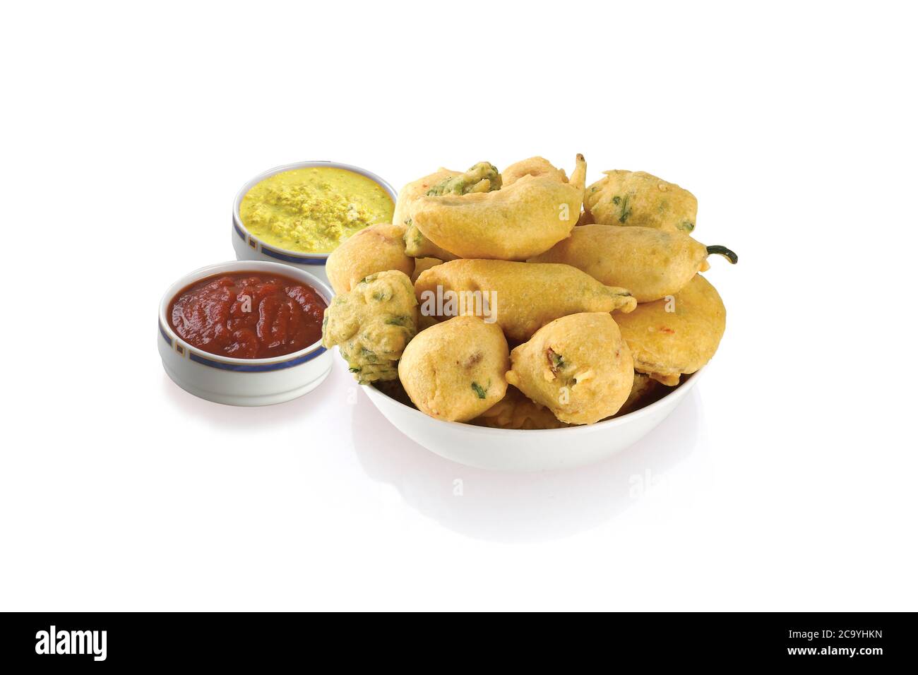 Methi Gota (fenugreek) Pakoda, Chili pakoda, potato pakoda (vada) or Fritters indian food snack, bhajiya, white background, photographi - Image Stock Photo