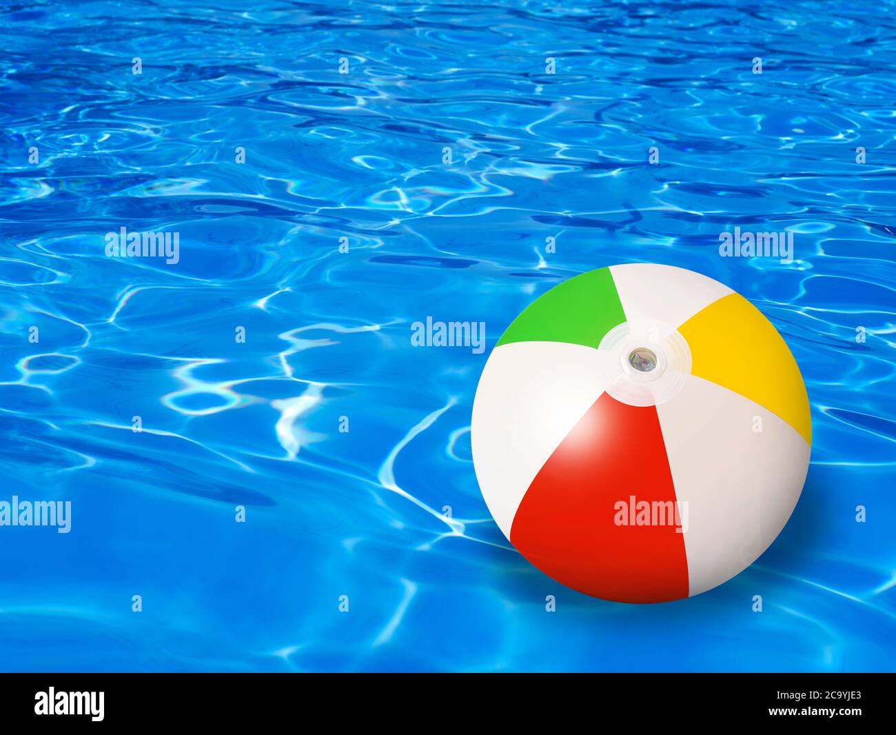 Beach ball floating on water Stock Photo Alamy