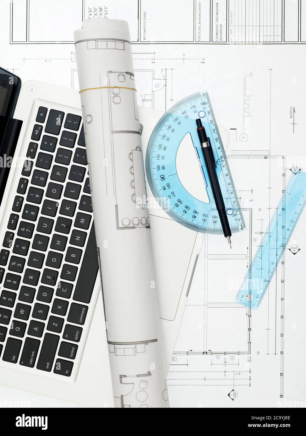 Blueprints and laptop Stock Photo Alamy